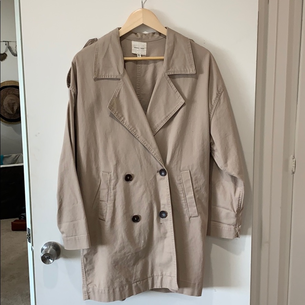 Oversized tan trench coat